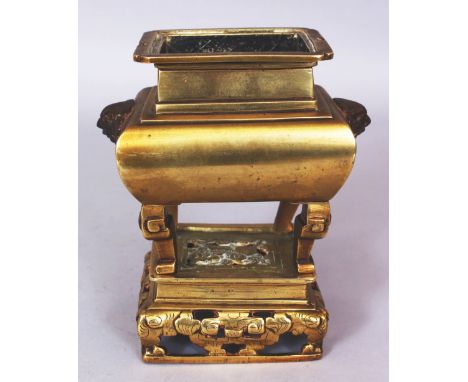 A 19TH/20TH CENTURY CHINESE POLISHED BRONZE CENSER ON STAND, weighing approx. 960gm, the sides of the censer cast with Buddhi