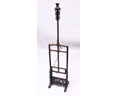 A GOOD 19TH CENTURY CHINESE CARVED HARDWOOD LAMP STAND, with carved and pierced frieze, 144cm high x 34cm wide