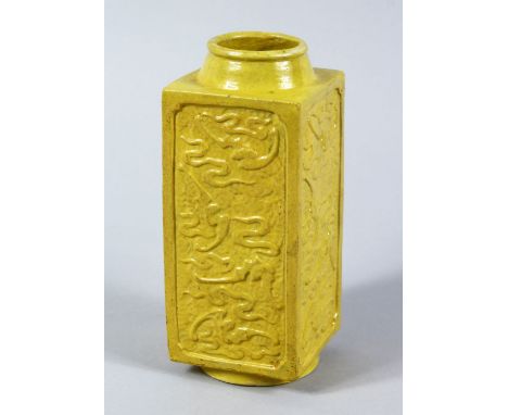 A CHINESE REPUBLIC PERIOD YELLOW GLAZED MOULDED CONG VASE, each section of the square form vase with moulded ribbon and bat d