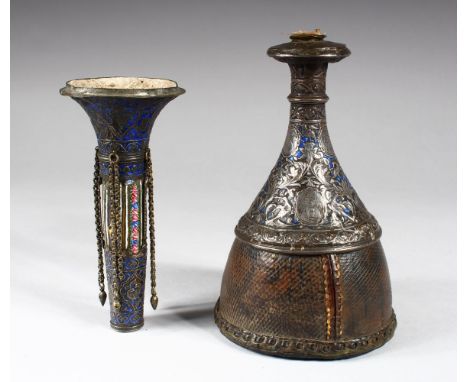 A ENGRAVED SILVER AND ENAMEL DECORATED HUQQA BASE, in three parts, the base engraved with panels of figures, 38cm high overal