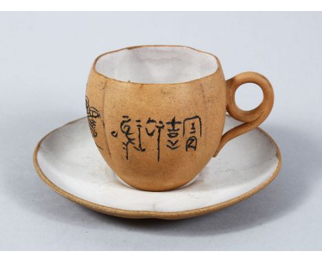 A CHINESE REPUBLIC PERIOD PARTIALLY GLAZED YIXING CLAY CUP &amp; SAUCER, the cup with incised calligraphy and floral decorati