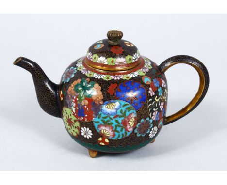 A GOOD LATE 19TH CENTURY CHINESE CLOISONNE TEAPOT &amp; COVER, the body of the pot with a black ground with brass wire scroll