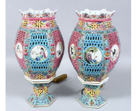 A PAIR OF 19TH / 20TH CENTURY CHINESE FAMILLE ROSE PORCELAIN HEXAGONAL LAMPS, the body pierced and decorated with roundel pan
