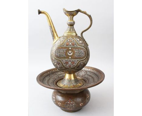 A VERY FINE 19TH CENTURY ISLAMIC DAMASCUS MAMLUK REVIVAL BRASS EWER AND BASIN, inlaid with silver and copper, the ewer of fla