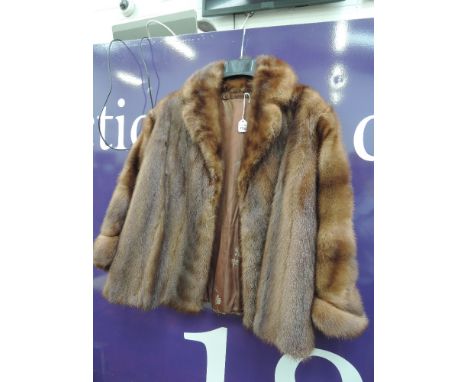 A vintage mink evening swing jacket having shawl collar and roll back cuffs