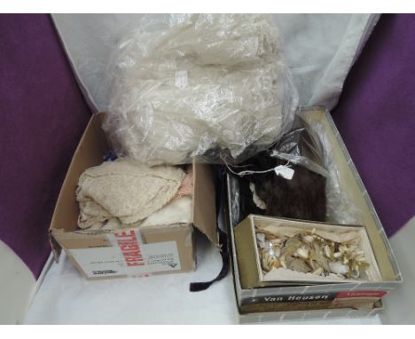 A box of vintage items,including fur collars, cake decorations, lace and net items, velvet ribbon etc, and a selection of vin