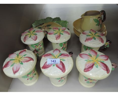 A set of Carltonware leaf design including set of six chocolate cups having cream groundCRACKS TO ONE LID