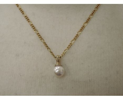 A cultured pearl pendant having 9ct gold loop on a 9ct gold figaro chain