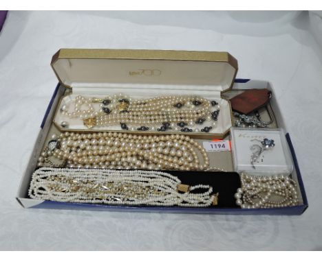 A selection of simulated pearl necklaces etc