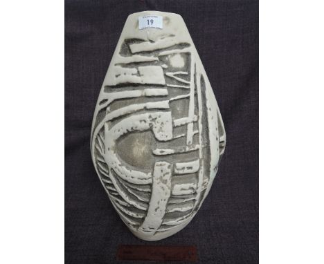 A 1970's Tremaen pottery lamp base having retro stylised decoration on cream ground Bowjay design