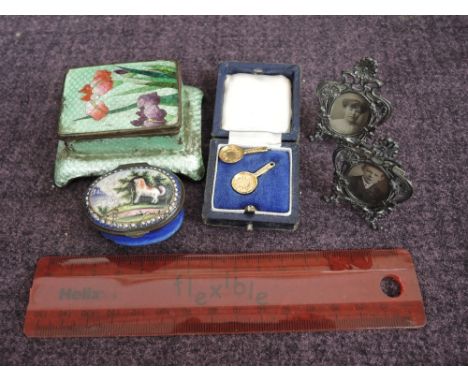 A selection of miscellaneous including cloisonne enamelled lidded trinket, two cased yellow metal lucky frying pan charms sta