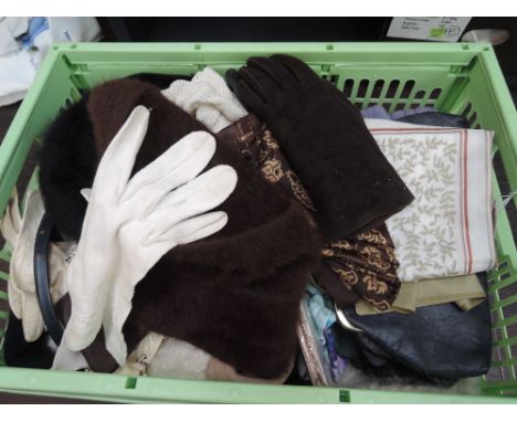 A mixed box of ladies vintage and modern accessories including belts, hats, head scarves and gloves, purses and clutch bags e