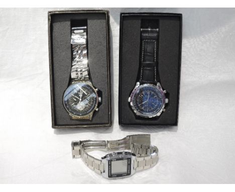 Two gent's modern wrist watches by Jaragar and a digital unmarked wrist watch