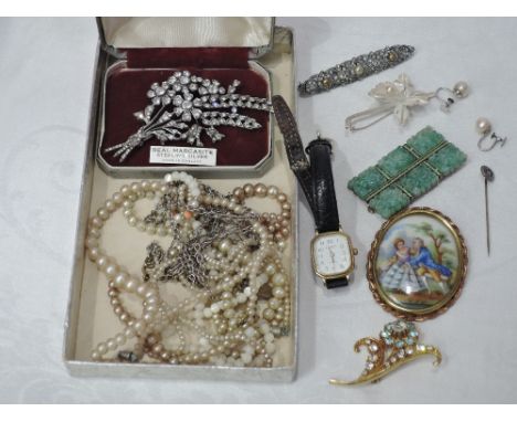 A small selection of costume jewellery including a Tissot wrist watch, strings of pearls, pair of cultured pearl screw back e