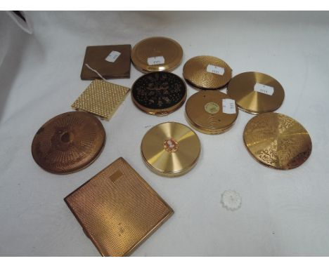 Eleven vintage powder compacts and mirrors of varios designs including Stratton and Mascot