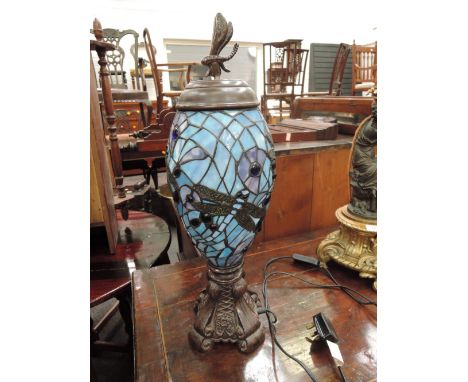 A modern Tiffeny style table lamp of blue glass, bulbous design having dragonfly decorationNo visible faults or repairs 