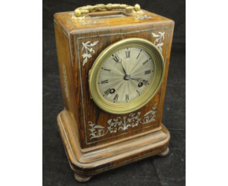 A 19th Century French rosewood and mother of pearl inlaid mantle clock, the eight day movement with silvered dial and Roman n