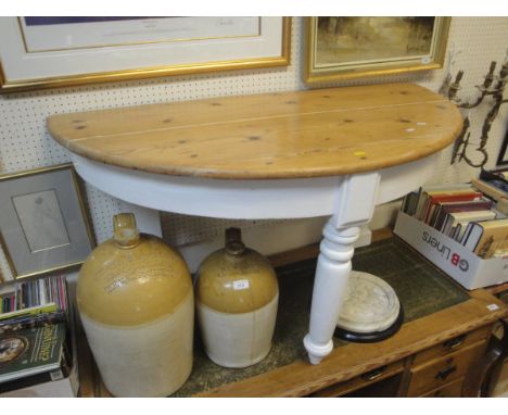 A pine and painted demi lune table with turned legs plank top and white painted base together with a white painted dressing t