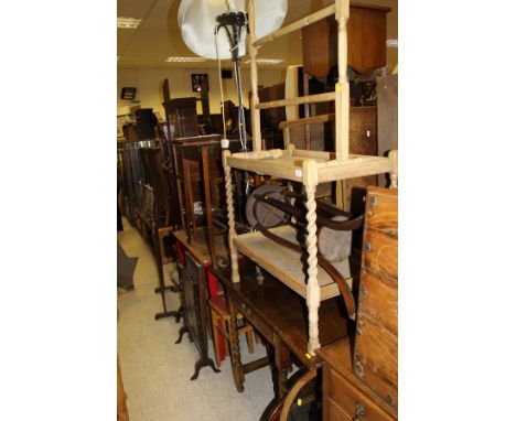 A collection of furniture comprising a early 20th Century oak dressing table, a similar drop leaf side table, a two tier side