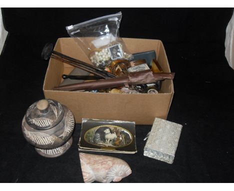 A box of sundries to include copper bracelets, collection of Max Ettlinger & Co Ltd postcards, soapstone figure of an owl, sp