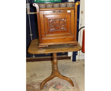 A Victorian walnut piano stool, the upholstered seat over a fall front music compartment, together with an oak snap-top occas