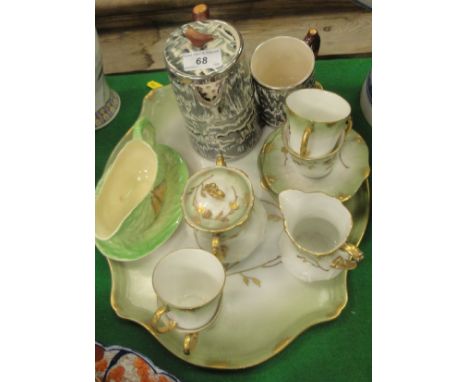 An Arthur Wood silver shield mug and jug, a Shorter & Son leaf pattern leaf and pear pattern sauceboat and stand and a Contin