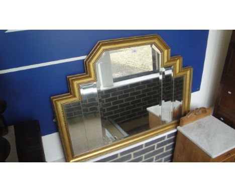 An Art Deco style overmantel mirror with multi-plate bevel edged glass within a gilt effect frame   CONDITION REPORTS  Approx