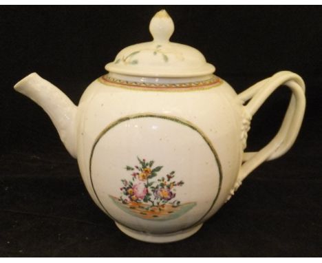 A Chinese Qianglong porcelain teapot of squash form, polychrome decorated with two oval panels of floral sprays within green 