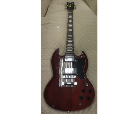 A "Vintage" Gibson six string electric SG copy guitar in soft case, together with a Cube-30X Roland amplifier   CONDITION REP