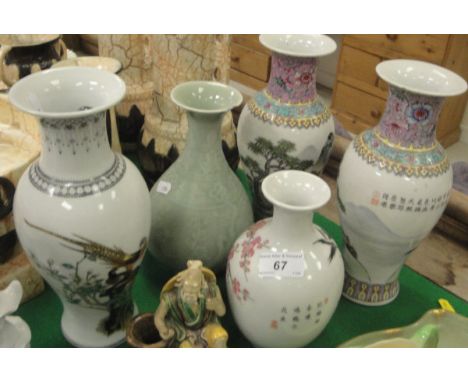 A collection of Oriental china wares including six various Chinese vases, a pair of blanc de chine figures of Guan Yin, Imari