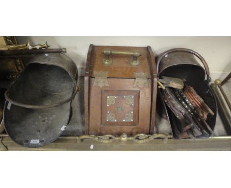 A collection of various metalwares to include copper coal helmets, bellows, fire guards, fire kerbs, brass stick stand, coppe