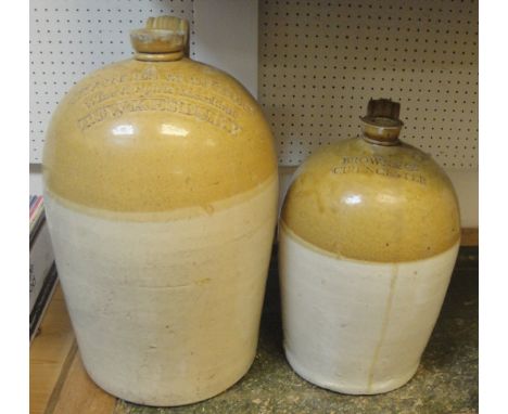 Two stoneware bottles, one marked "Brown & Co. Cirencester", the other marked "Charles Mather Wine & Spirit Merchant Tewkesbu