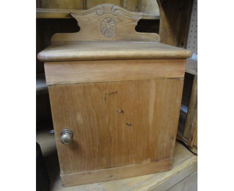 An oak folding smoker's stand with folding top, a pine single door wall hanging cabinet enclosing shelves, assorted copper bo