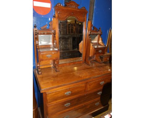 A Victorian walnut dressing chest with mirrored super structure above two short over two long drawers to plinth base, togethe