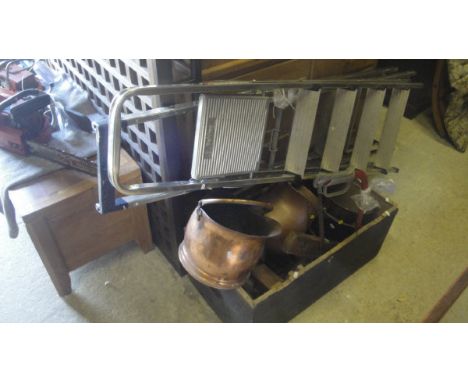 A wooden trunk containing various wooden handled planes, iron and copper buckets etc. plus two step ladders