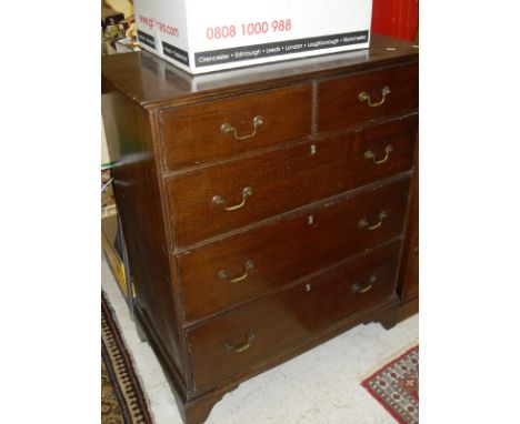 A 19th Century oak chest of two short over three long drawers to bracket feet