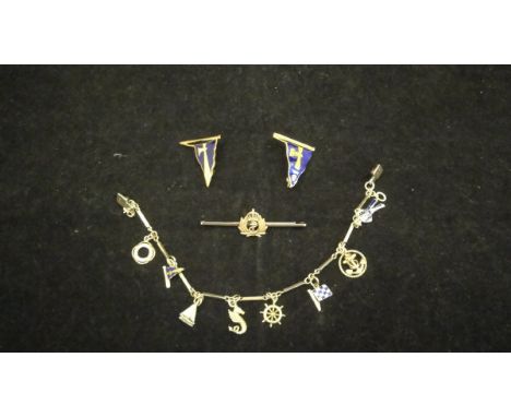 A 9 carat gold charm bracelet set with ten various charms of a maritime nature, together with a 9 carat gold pin as a flag wi