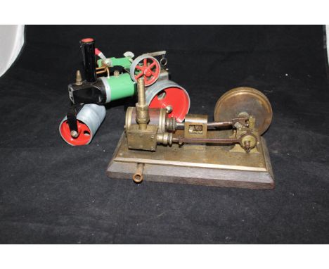 A Mamod toy steam engine, together with a further model stationary steam engine