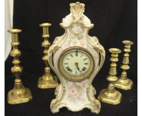 A selection of brass wares to include two pairs of candlesticks, brass coal helmet, bells, etc, together with a late 19th Cen