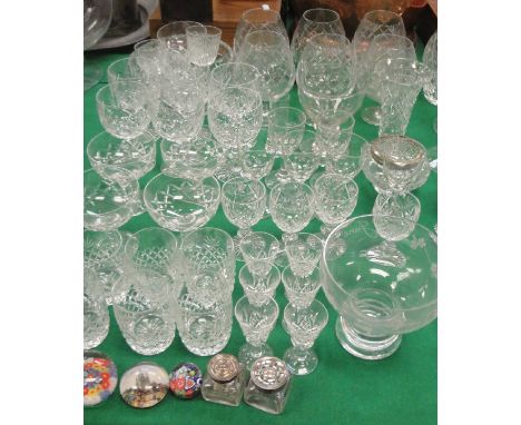 A set of six cut glass wine glasses, a set of six 19th Century wines with circle cut to the bottom of the bowls on baluster s