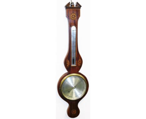 A late 19thC mahogany and part inlaid banjo barometer, the broken pedimented hood, surmounted by an urn finial, with a part i