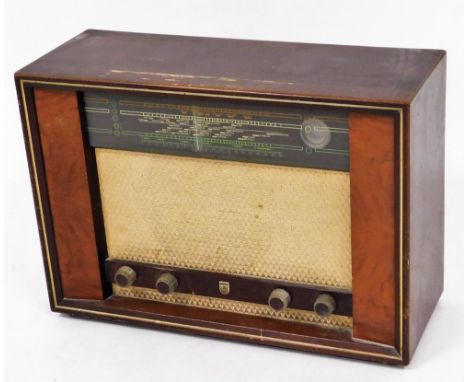 A vintage Phillips radio, of rectangular form, type BG514A, with front speaker and tuning knops, 52cm wide.