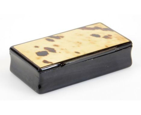 An early 20thC papier mache and blonde tortoise shell finish snuff box, of rectangular form with thumb mould lid and plain in