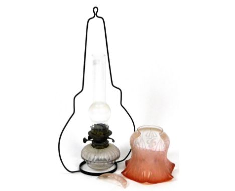 A Victorian hanging oil lamp, the part cranberry tinted shade decorated with flowers, etc., with Superior Duplex mechanism an
