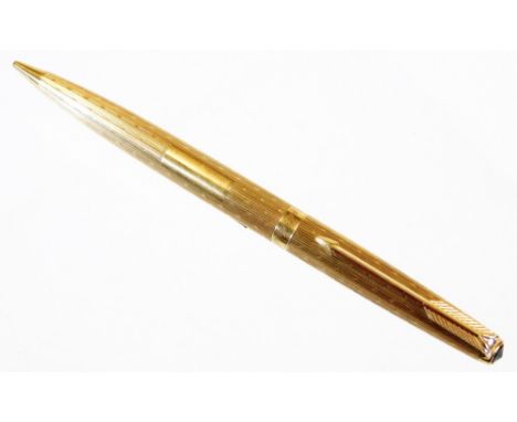 A 9ct gold Parker pencil, with engine turned body, plain cartouche and arrow clip, 12cm wide.