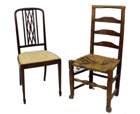 A 19thC ash and elm rush seated chair, with ladder back, turned front legs, joined by a turned stretcher and an Edwardian mah