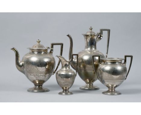 A late Victorian silver four piece tea and coffee service of globular chased form, having angular handles, beaded rims, Londo