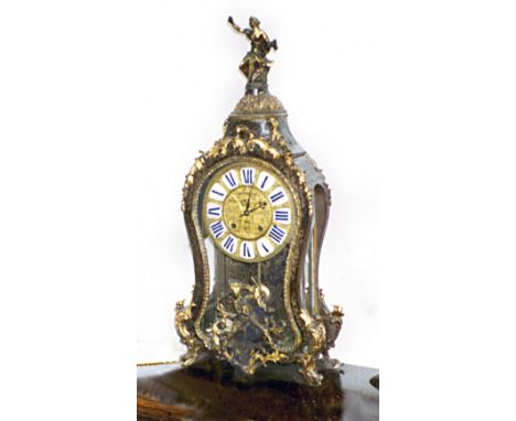 A late18c French boullework bracket clock which has suffered a catastrophic fall and is now in many pieces.  These have been 