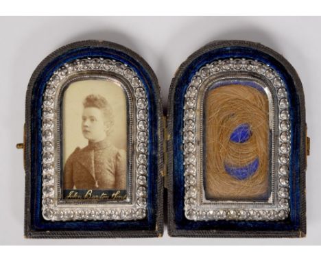 A miniature photographic portrait of a lady in a double memoriam miniature, the other panel with a lock of hair, all within a