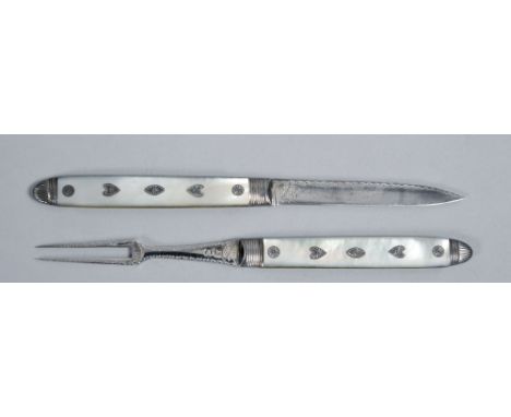 A late Georgian silver fruit knife and fork with mother of pearl cased handles, these set with silver hearts and roundels, ea